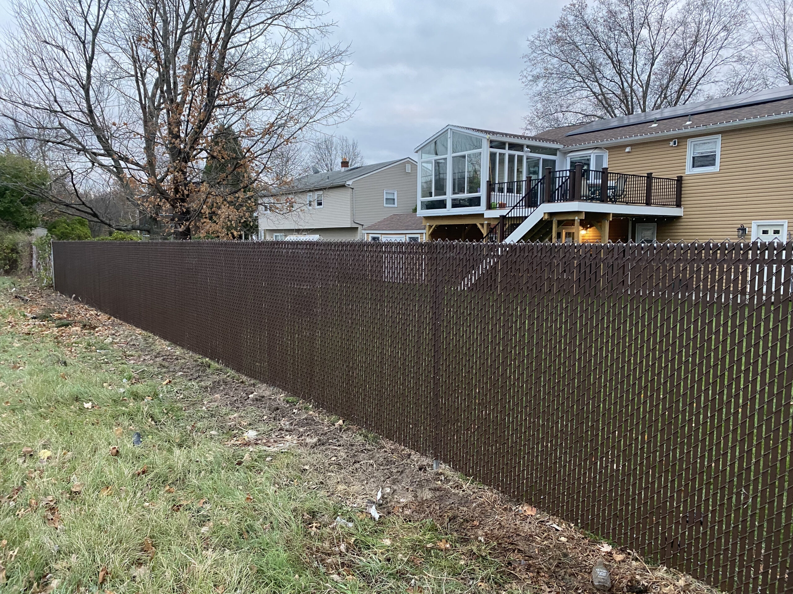 chainlink fence installation with brown slats franklin park nj